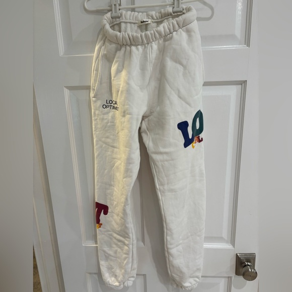 Madhappy White Sweatpants with Elastic Waistband and Relaxed Fit - Picture 1 of 7